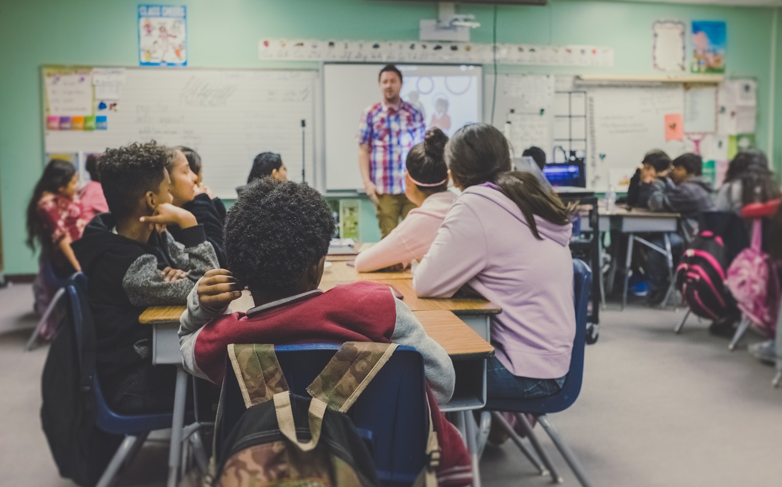 Teacher leading an engaged K-12 classroom, representing the observations Voxento helps schools capture